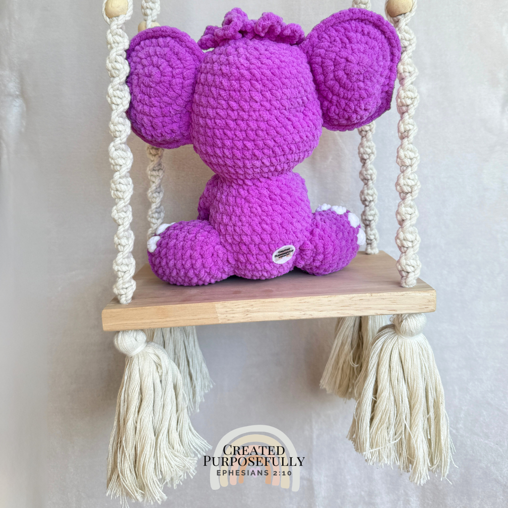 Handmade crochet elephant plush made with soft plush yarn and adorable handmade details