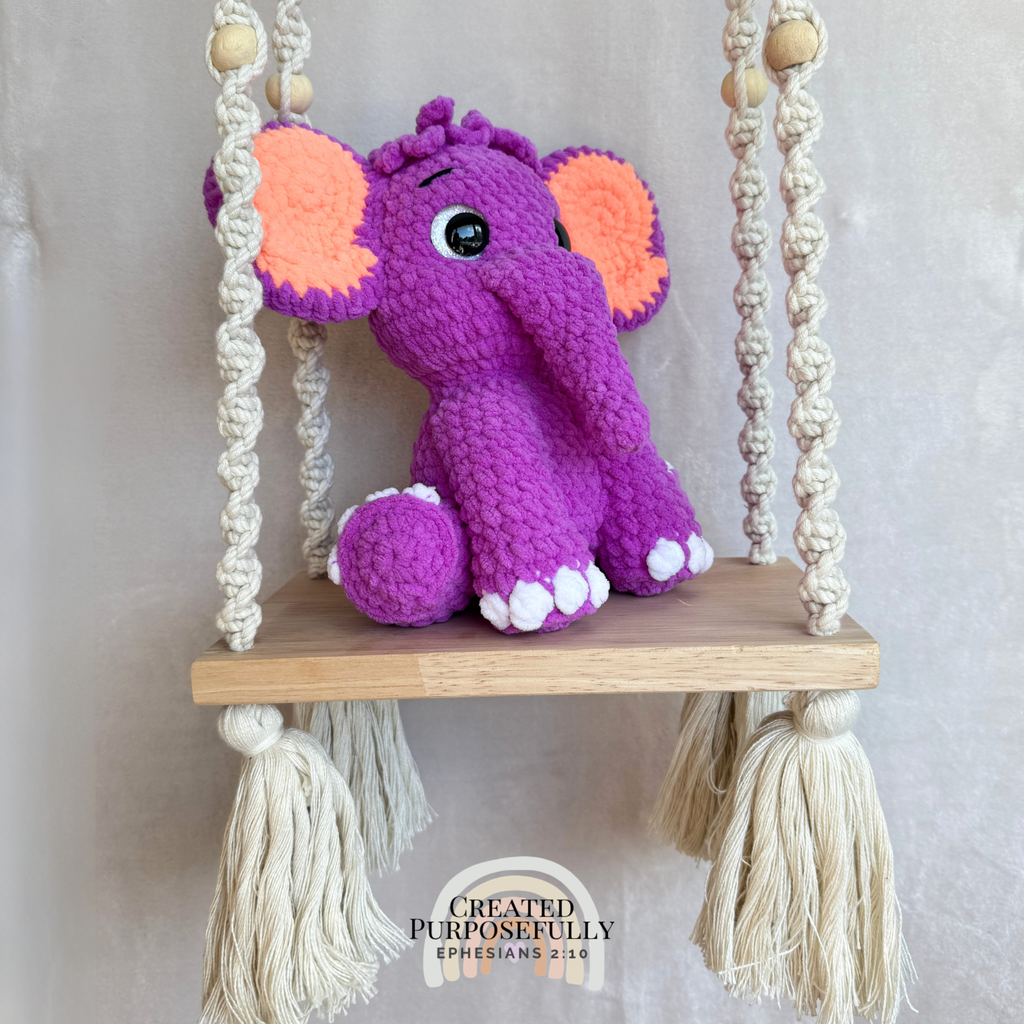 Handmade crochet elephant plush made with soft plush yarn and adorable handmade details