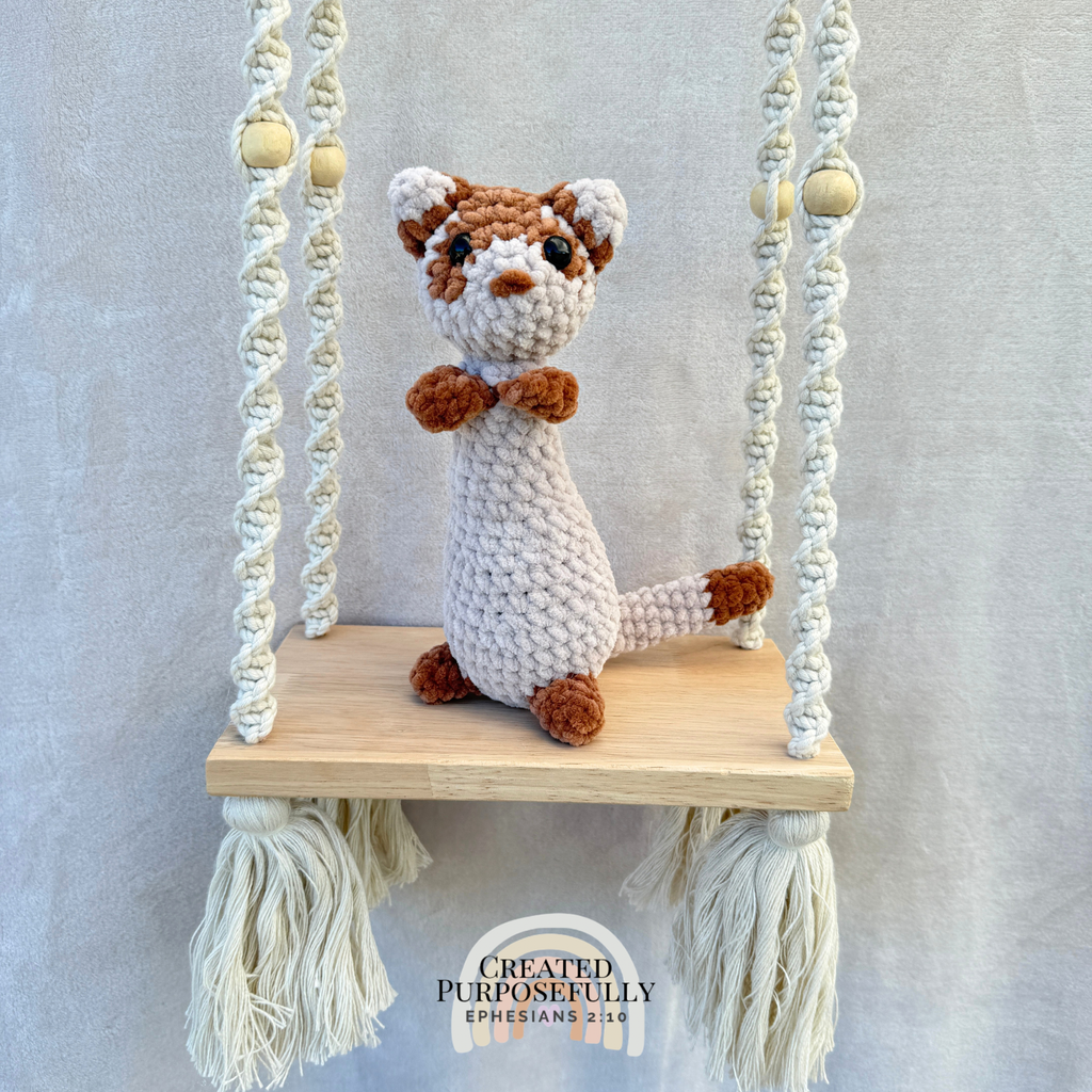 Handmade crochet ferret plush with a long cuddly body made with soft yarn by Created Purposefully