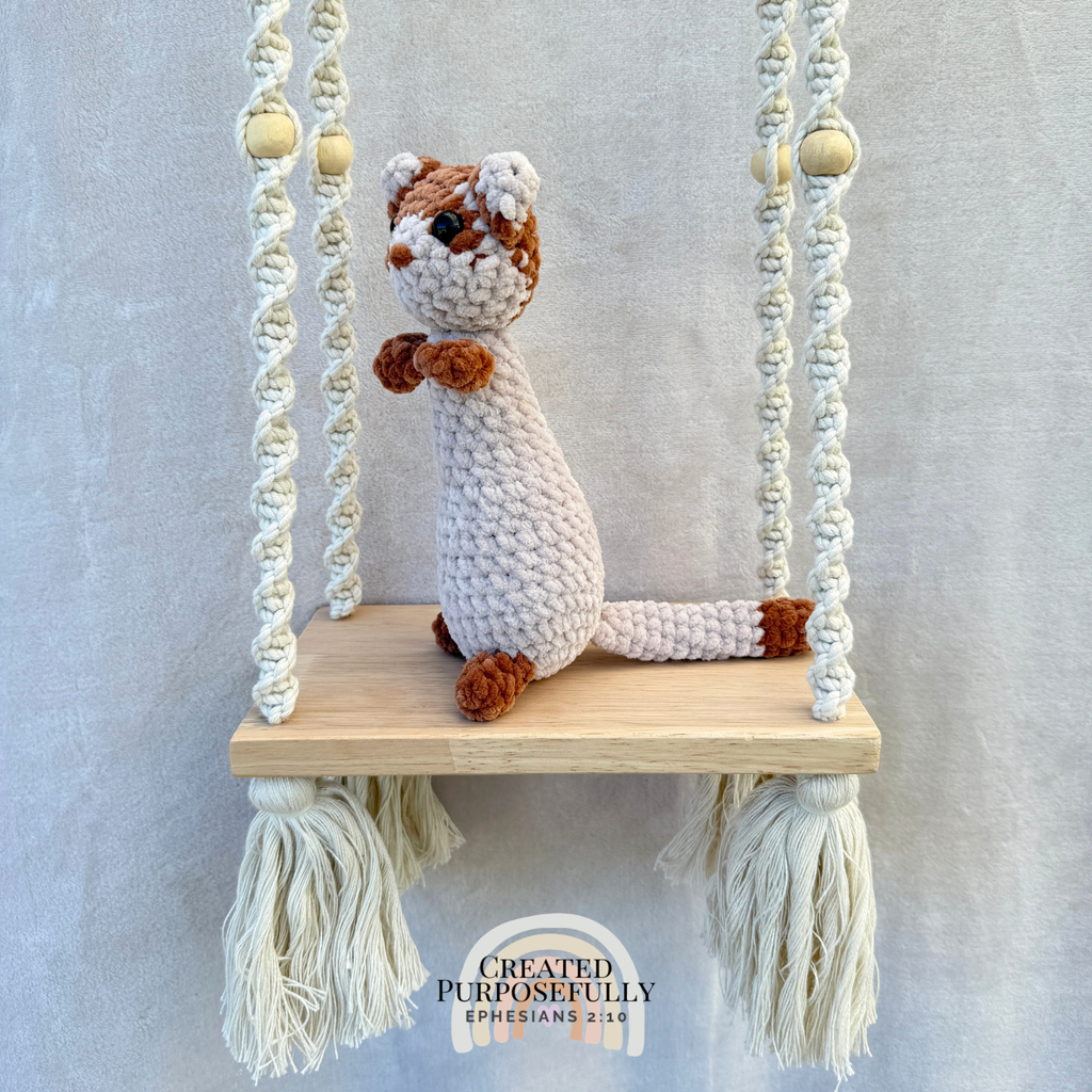 Handmade crochet ferret plush with a long cuddly body made with soft yarn by Created Purposefully