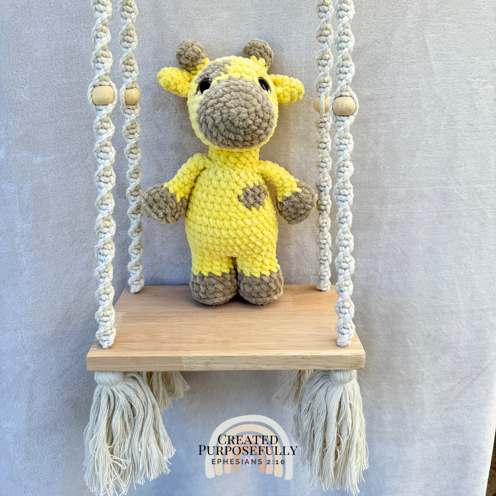 Handmade crochet giraffe plush with adorable spots made with soft cuddly yarn by Created Purposefully