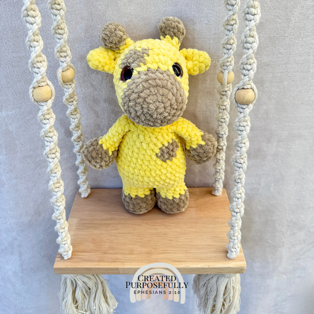 Handmade crochet giraffe plush with adorable spots made with soft cuddly yarn by Created Purposefully