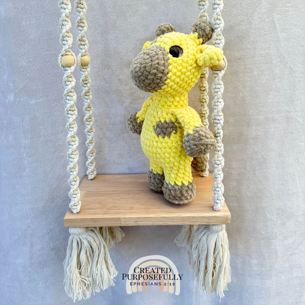 Handmade crochet giraffe plush with adorable spots made with soft cuddly yarn by Created Purposefully