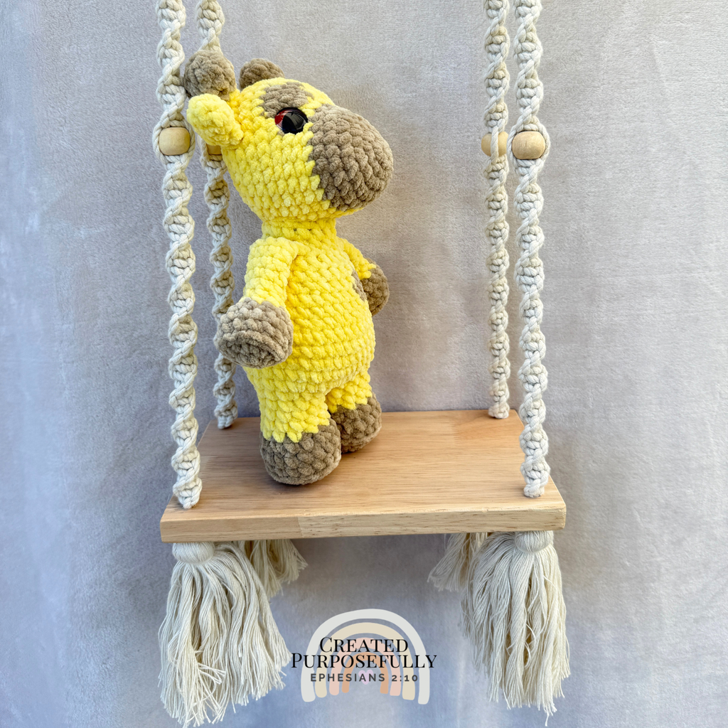 Handmade crochet giraffe plush with adorable spots made with soft cuddly yarn by Created Purposefully
