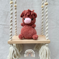 Handmade crochet Highland cow plush made with soft plush yarn, a cute stuffed farm animal gift for kids, cow lovers, and plush collectors.