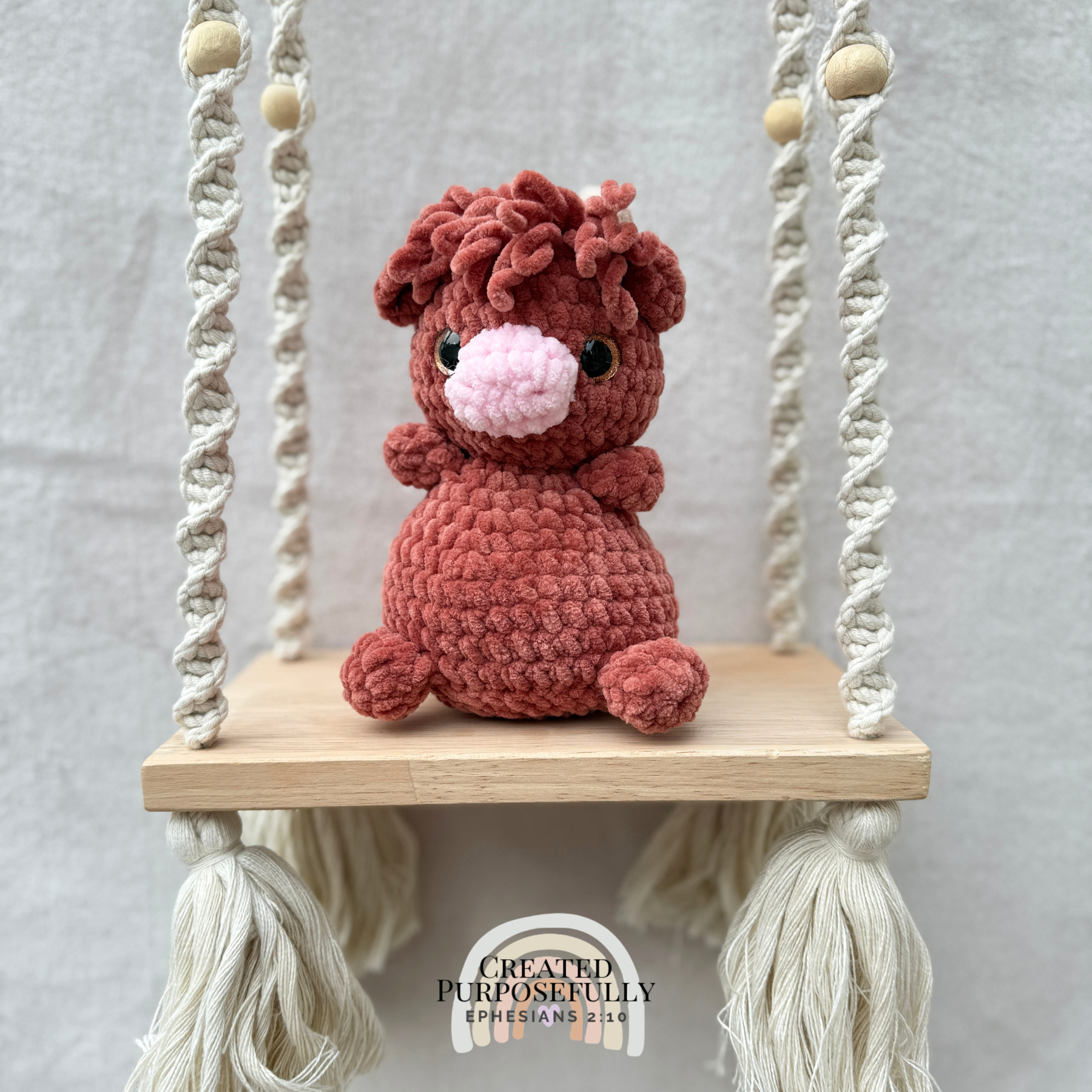 Handmade crochet Highland cow plush made with soft plush yarn, a cute stuffed farm animal gift for kids, cow lovers, and plush collectors.