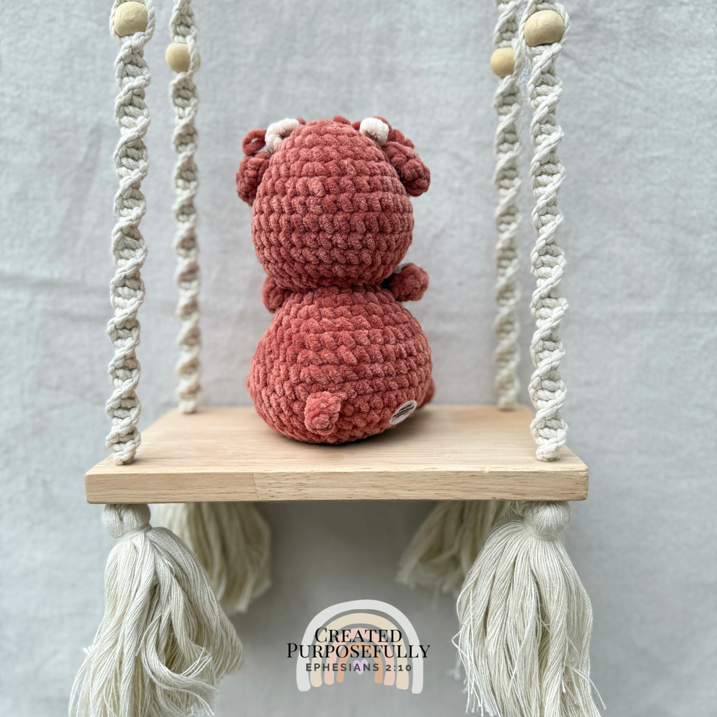 Handmade crochet Highland cow plush made with soft plush yarn, a cute stuffed farm animal gift for kids, cow lovers, and plush collectors.