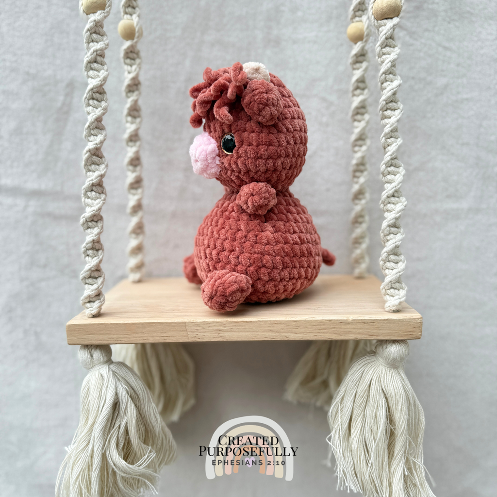 Handmade crochet Highland cow plush made with soft plush yarn, a cute stuffed farm animal gift for kids, cow lovers, and plush collectors.