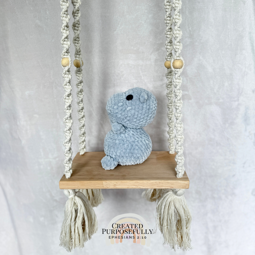 Shop a sweet handmade crochet hippo made with soft plush yarn. Choose your favorite color for a cuddly handmade gift perfect for kids and hippo lovers.