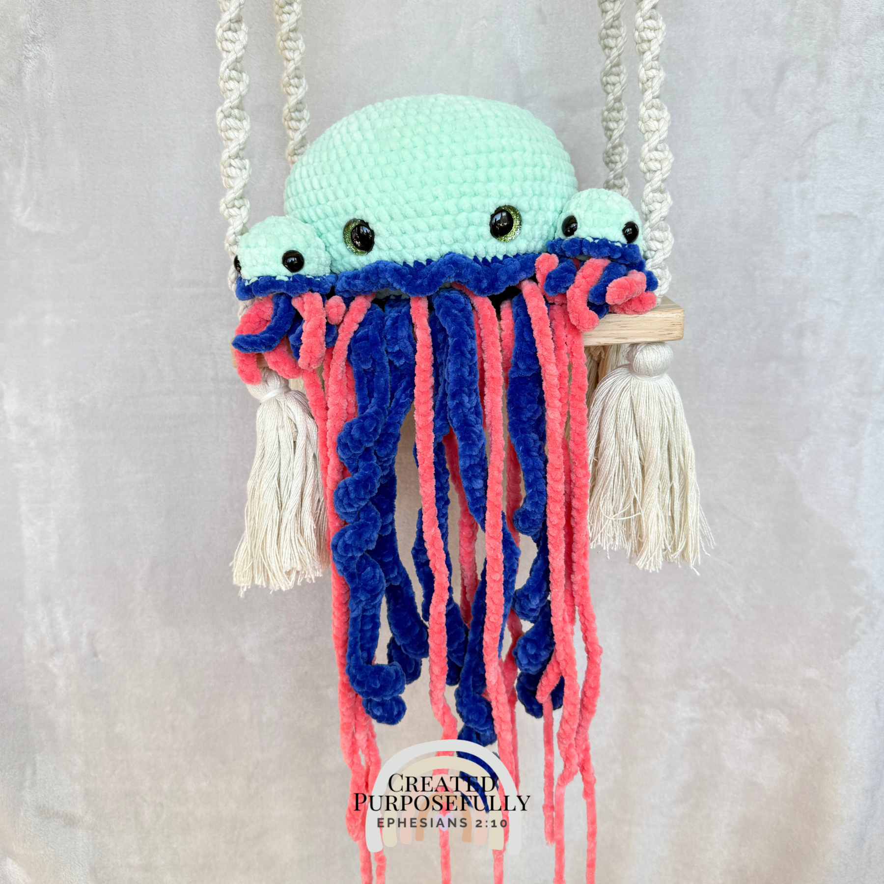 Handmade crochet jellyfish family with one mama jellyfish and two baby jellyfish made with soft plush yarn