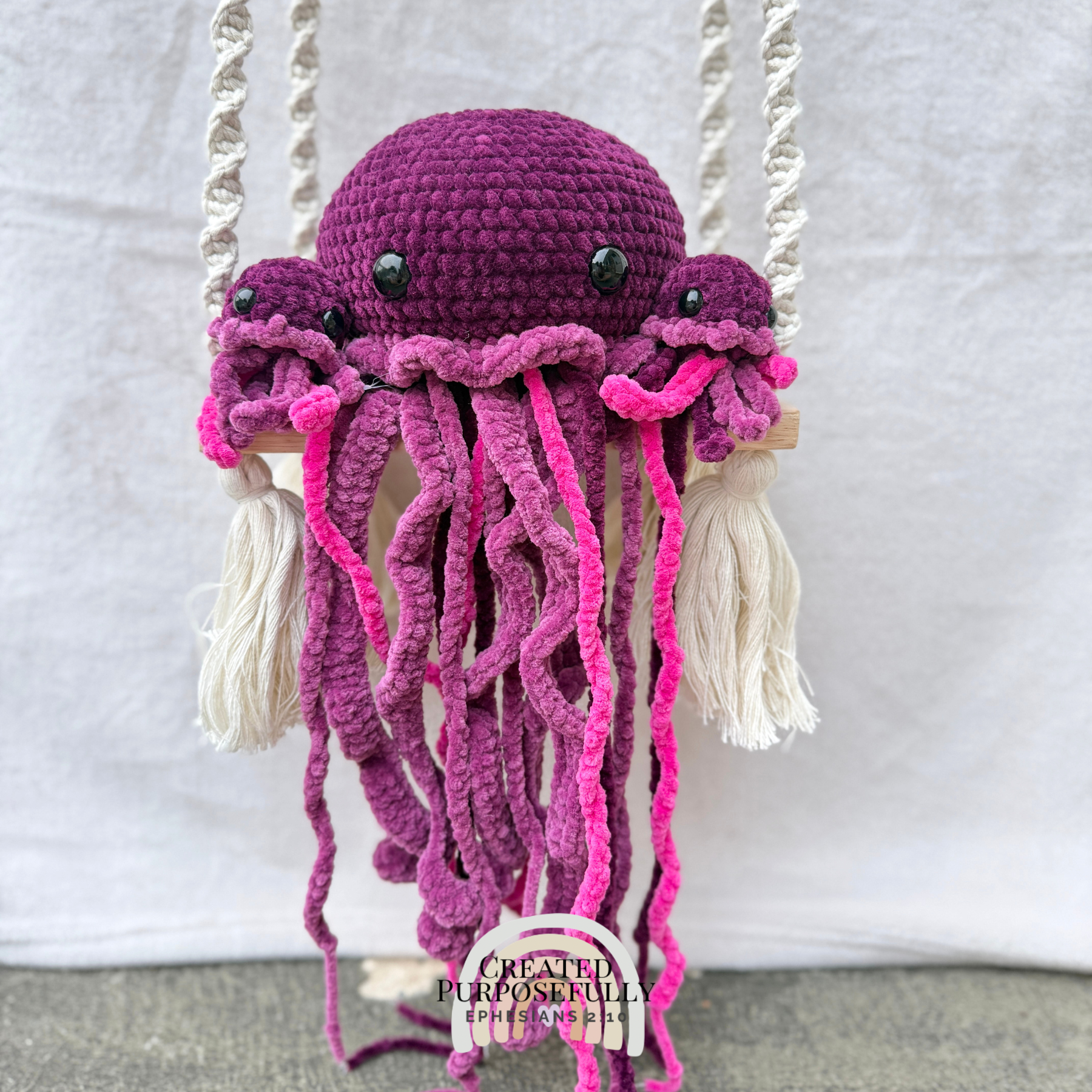 Handmade crochet jellyfish family with one mama jellyfish and two baby jellyfish made with soft plush yarn