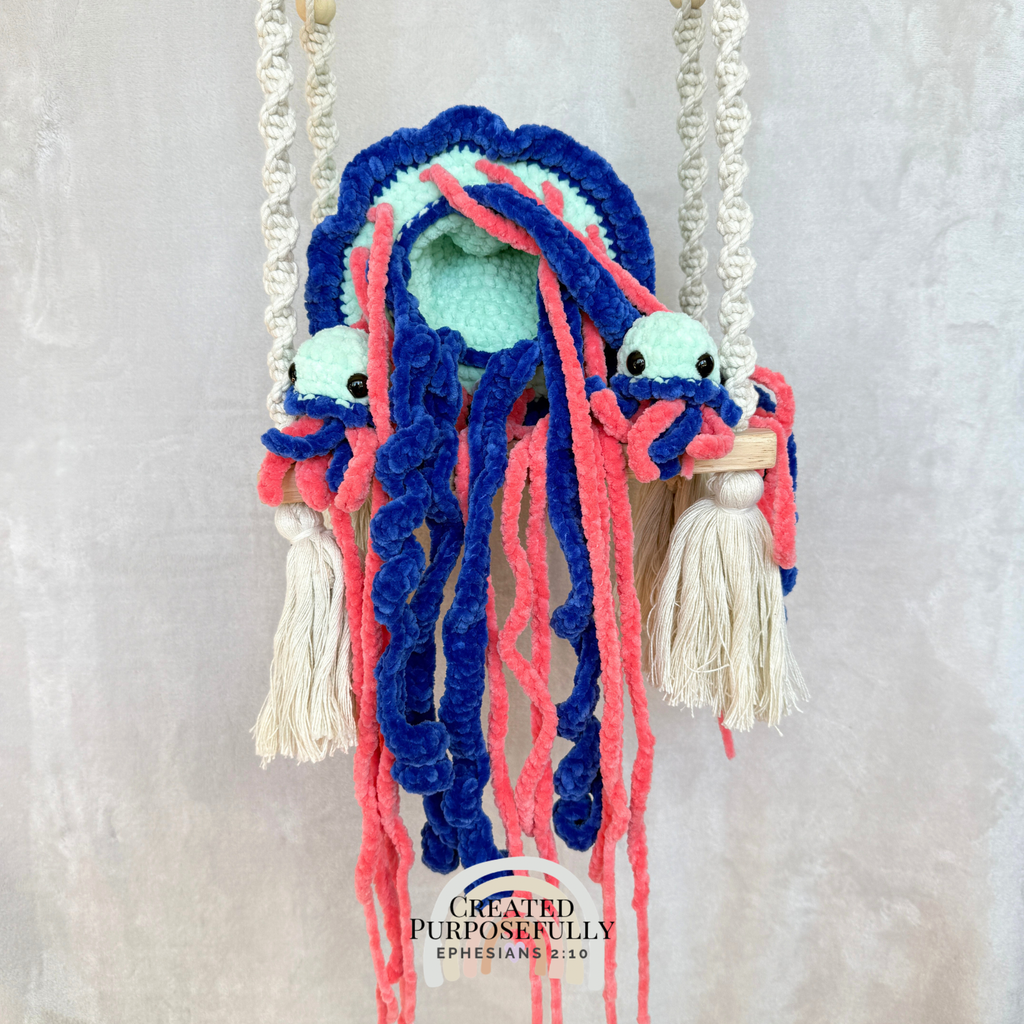 Handmade crochet jellyfish family with one mama jellyfish and two baby jellyfish made with soft plush yarn