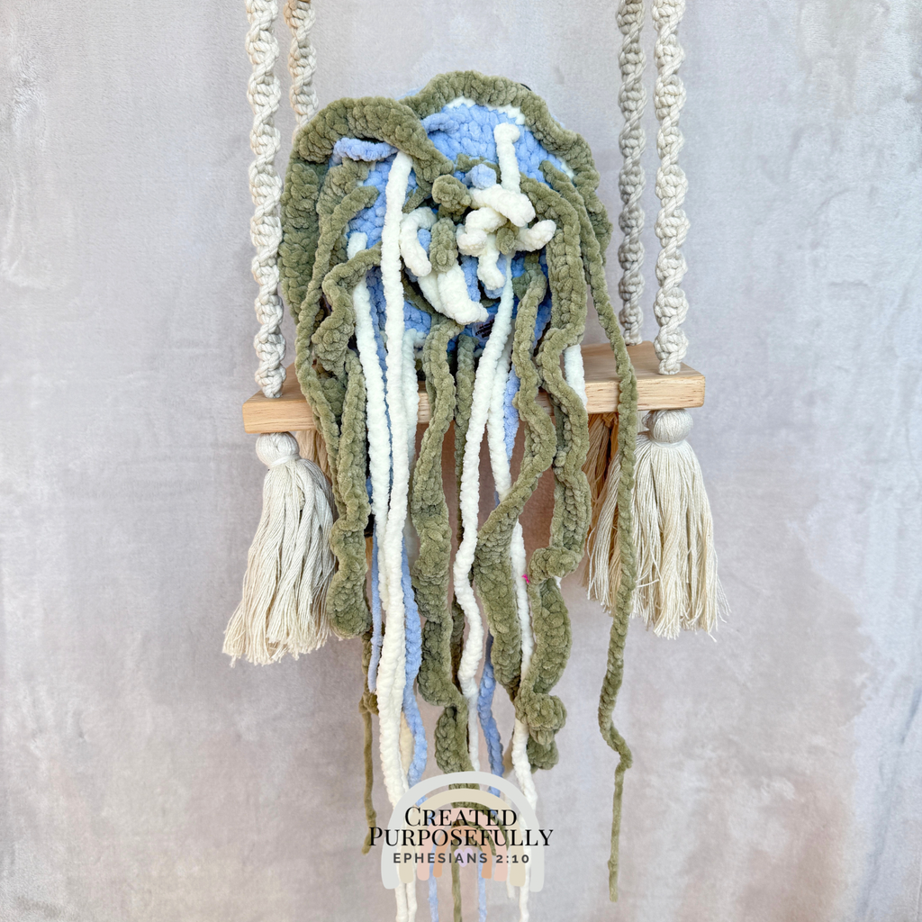 Handmade crochet jellyfish family with one mama jellyfish and two baby jellyfish made with soft plush yarn