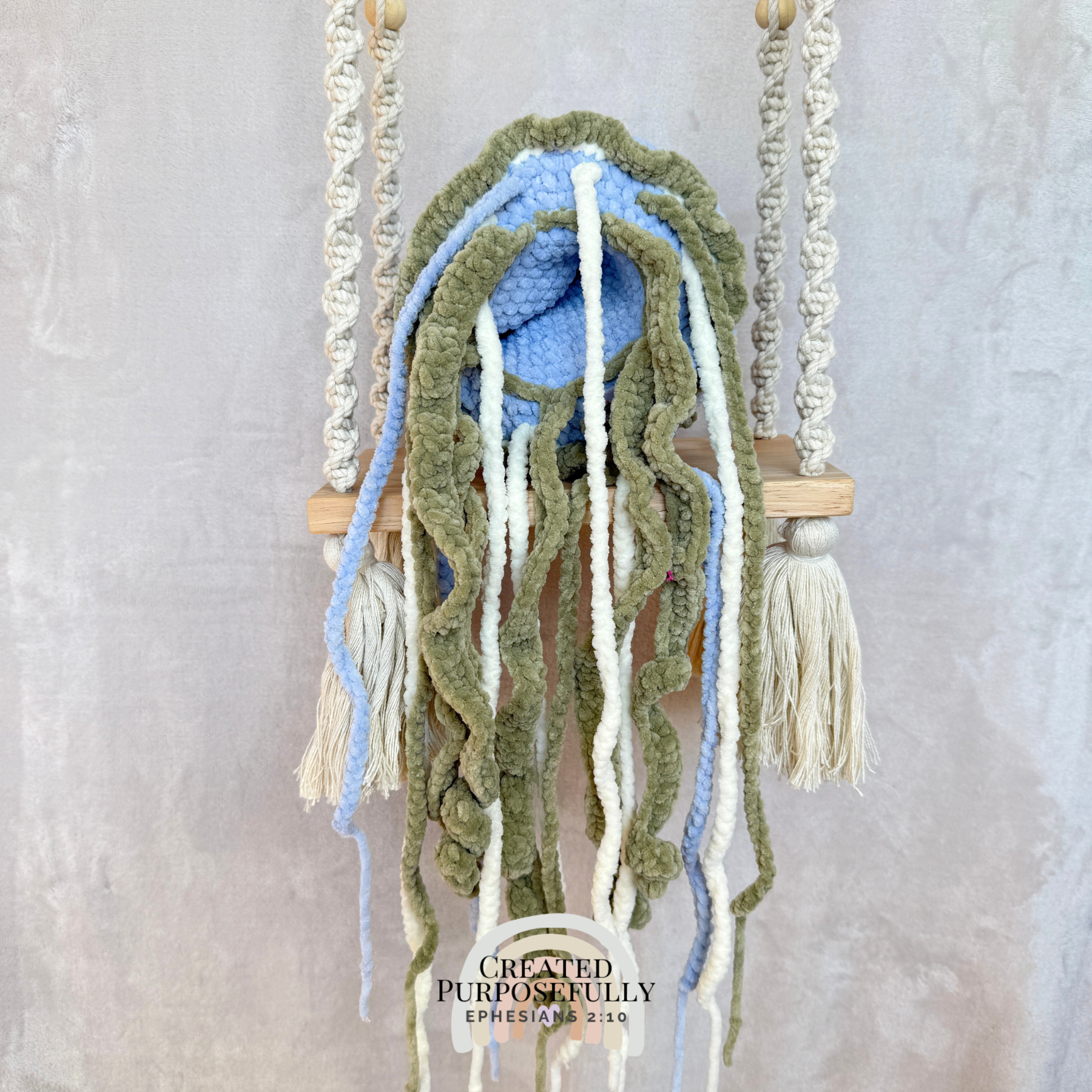 Handmade crochet jellyfish family with one mama jellyfish and two baby jellyfish made with soft plush yarn
