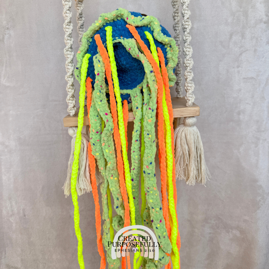 Handmade crochet jellyfish family with one mama jellyfish and two baby jellyfish made with soft plush yarn