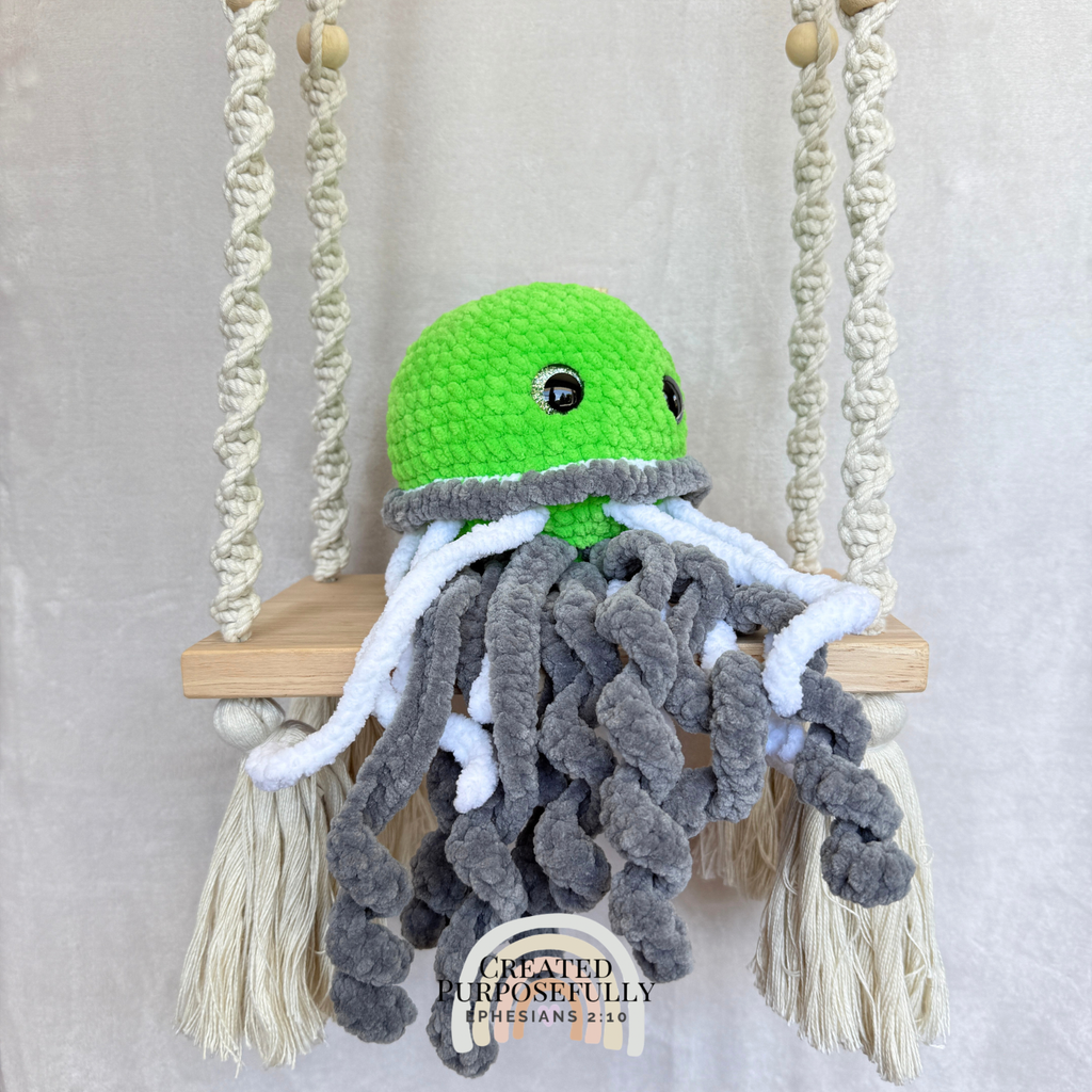 Handmade crochet jellyfish plush made with soft plush yarn and adorable ocean animal details