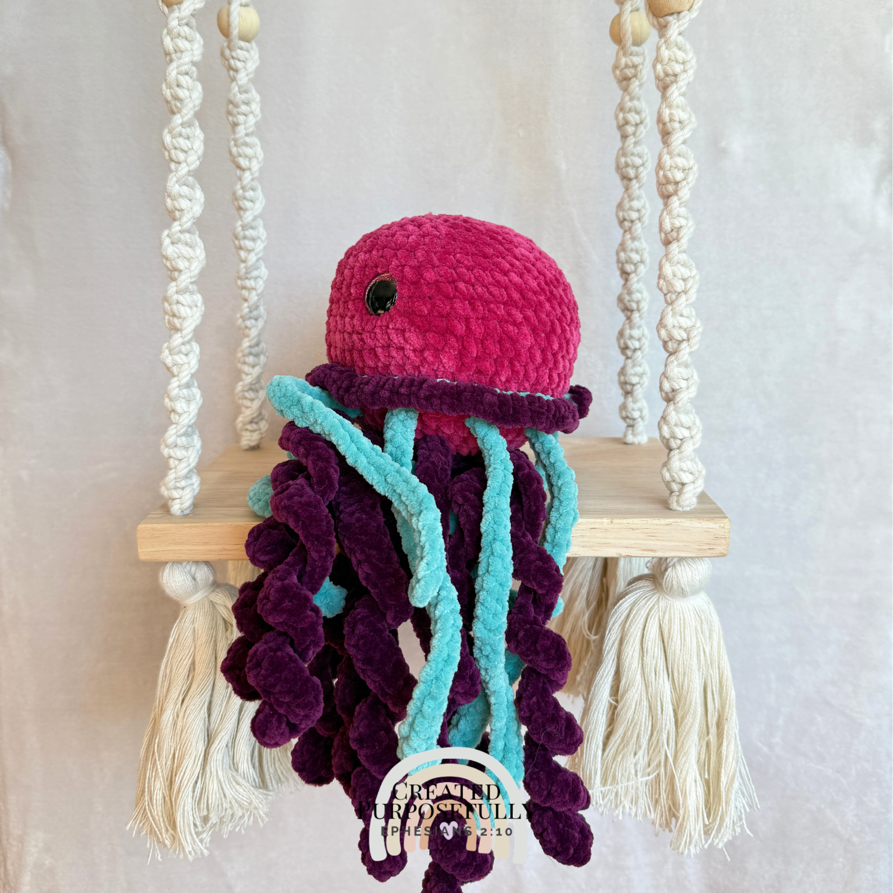 Handmade crochet jellyfish plush made with soft plush yarn and adorable ocean animal details