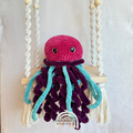 Handmade crochet jellyfish plush made with soft plush yarn and adorable ocean animal details