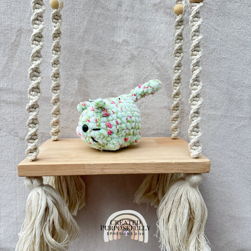 Handmade crochet mini lazy cat plush made with soft plush yarn, a cute stuffed cat gift for kids, cat lovers, and plush collectors.
