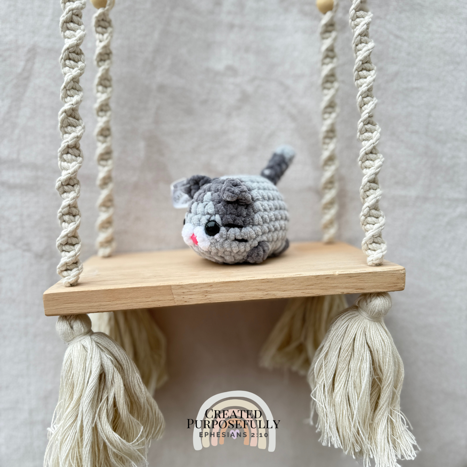 Handmade crochet mini lazy cat plush made with soft plush yarn, a cute stuffed cat gift for kids, cat lovers, and plush collectors.