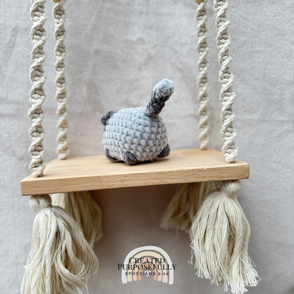 Handmade crochet mini lazy cat plush made with soft plush yarn, a cute stuffed cat gift for kids, cat lovers, and plush collectors.