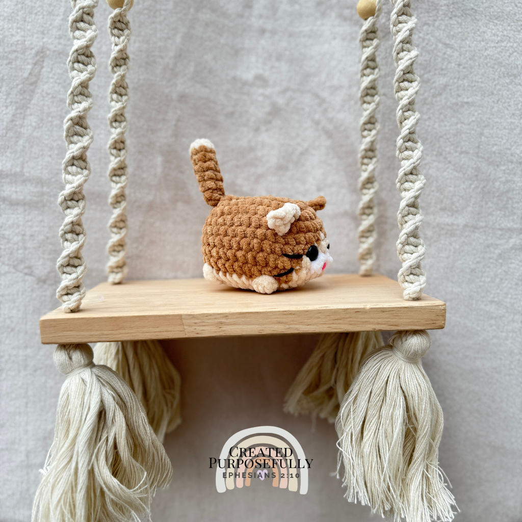 Handmade crochet mini lazy cat plush made with soft plush yarn, a cute stuffed cat gift for kids, cat lovers, and plush collectors.