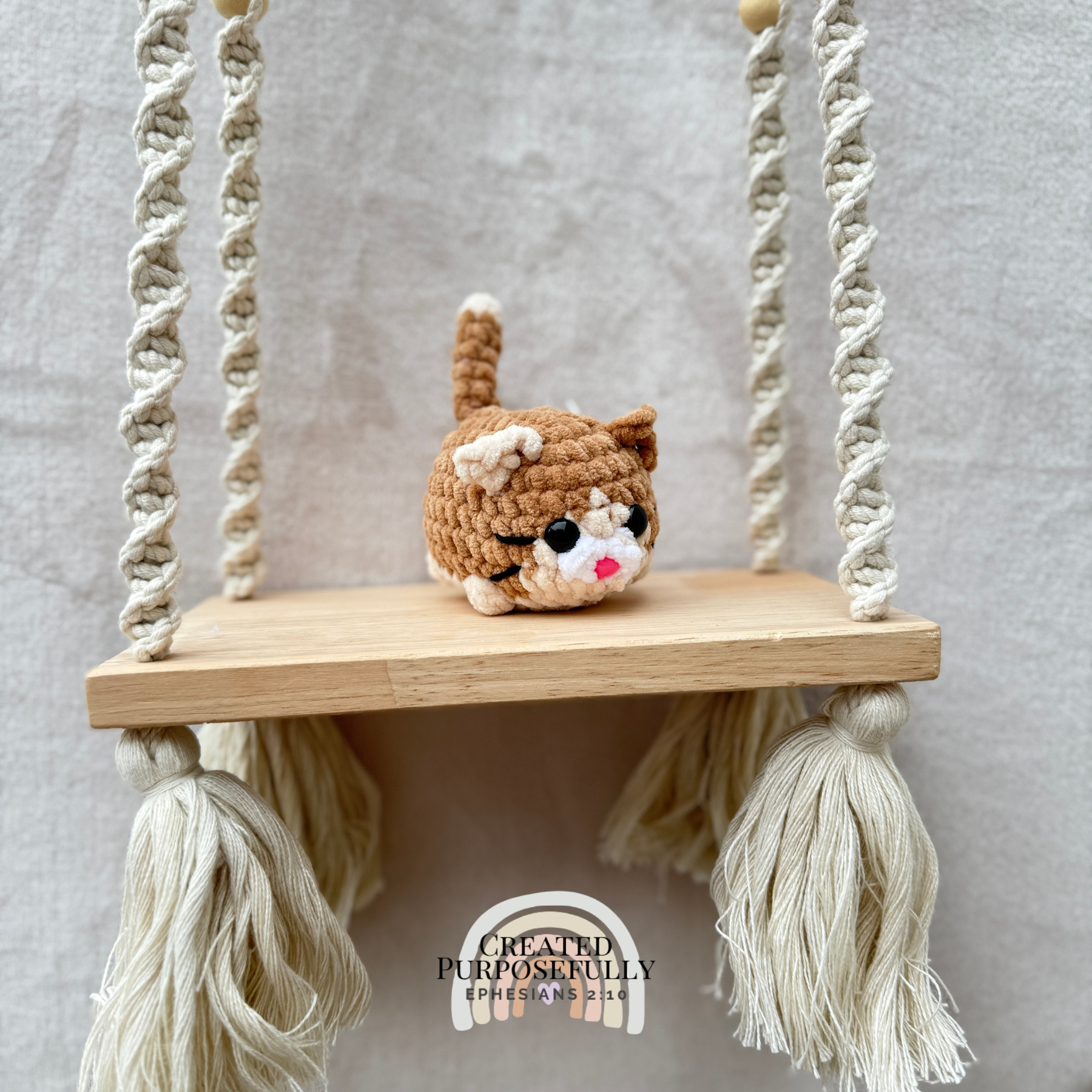 Handmade crochet mini lazy cat plush made with soft plush yarn, a cute stuffed cat gift for kids, cat lovers, and plush collectors.