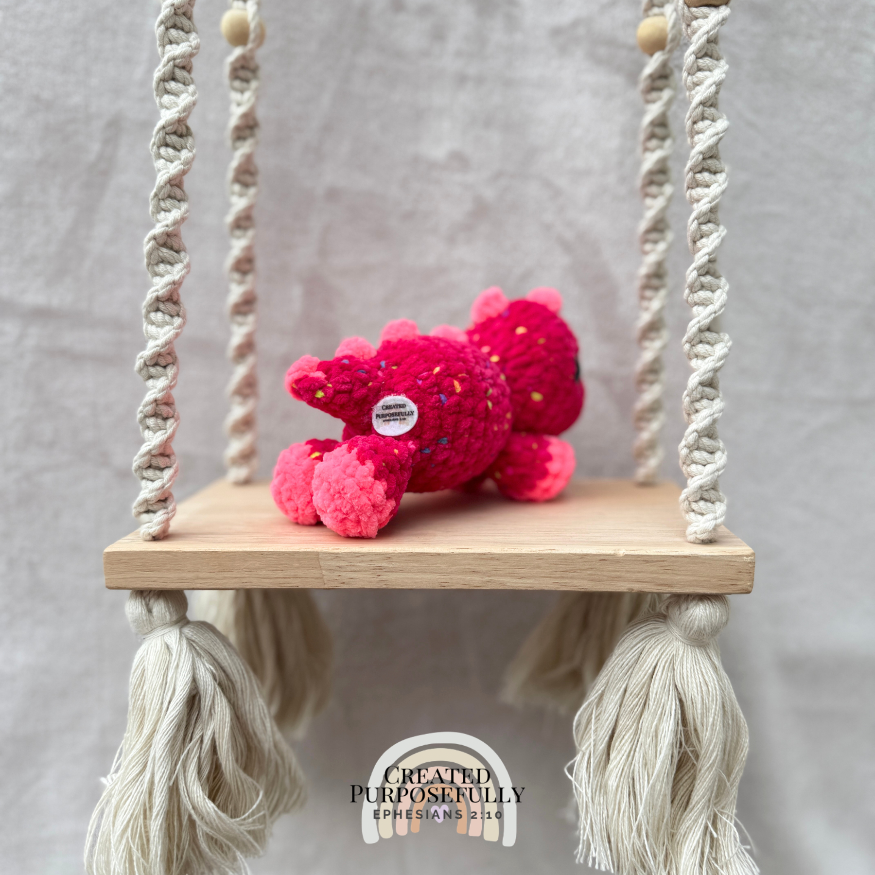 Handmade crochet mini Stegosaurus plush made with soft plush yarn, a cute stuffed dinosaur gift for kids, dino lovers, and plush collectors.