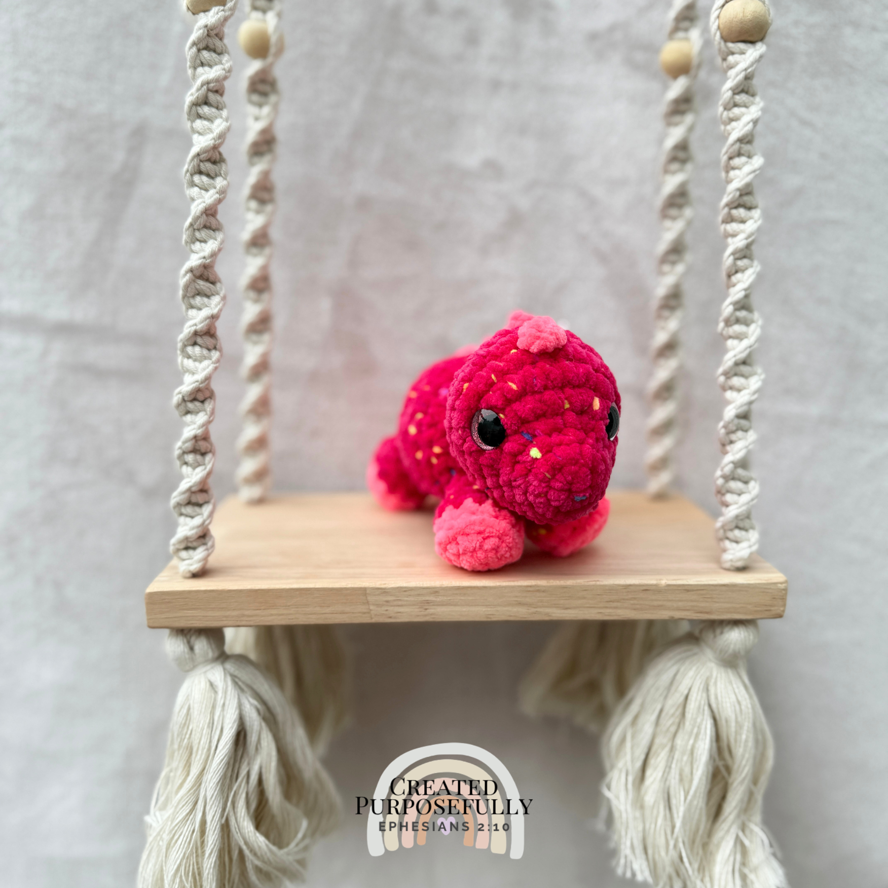 Handmade crochet mini Stegosaurus plush made with soft plush yarn, a cute stuffed dinosaur gift for kids, dino lovers, and plush collectors.