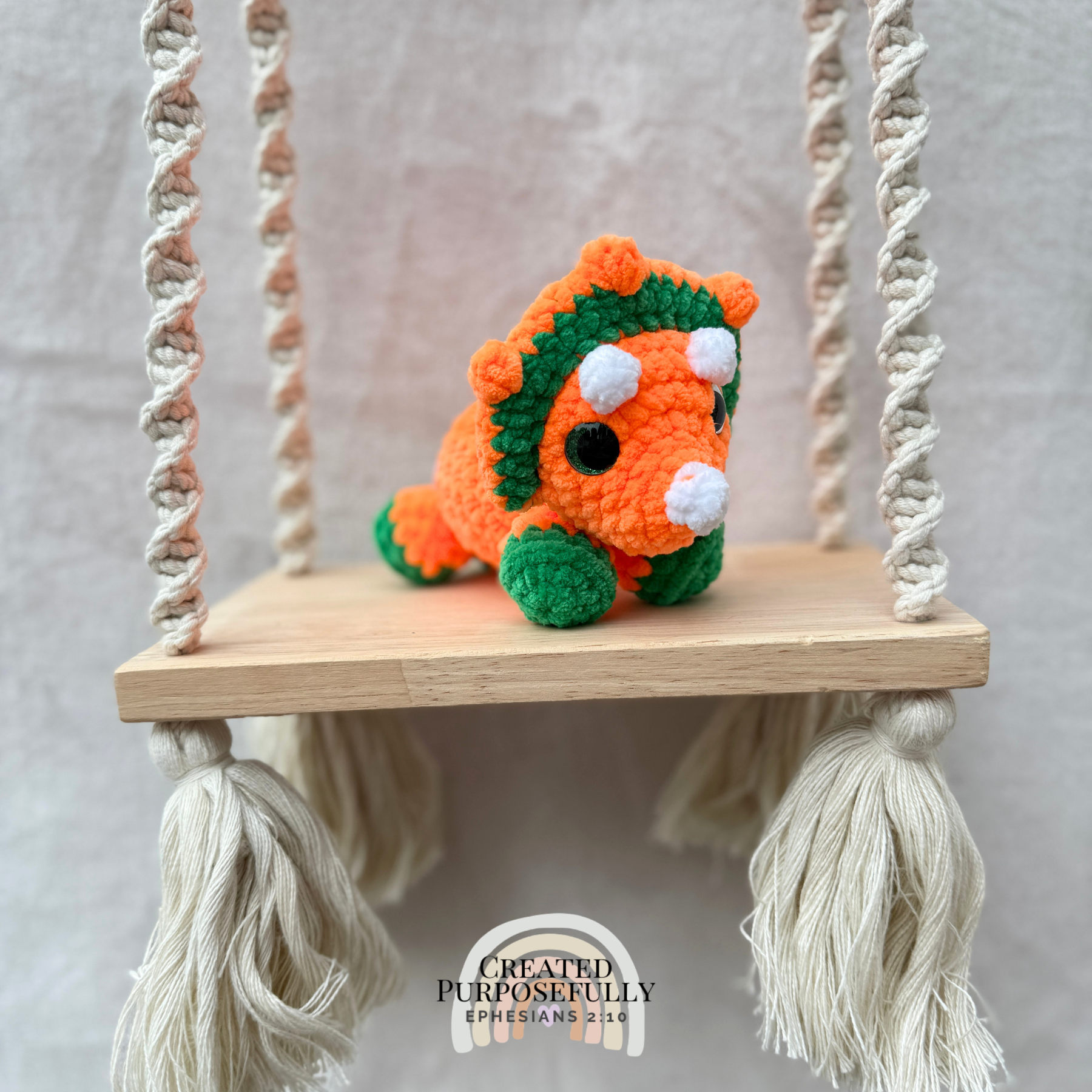 Handmade crochet mini Triceratops plush made with soft plush yarn, a cute stuffed dinosaur gift for kids, dino lovers, and plush collectors.