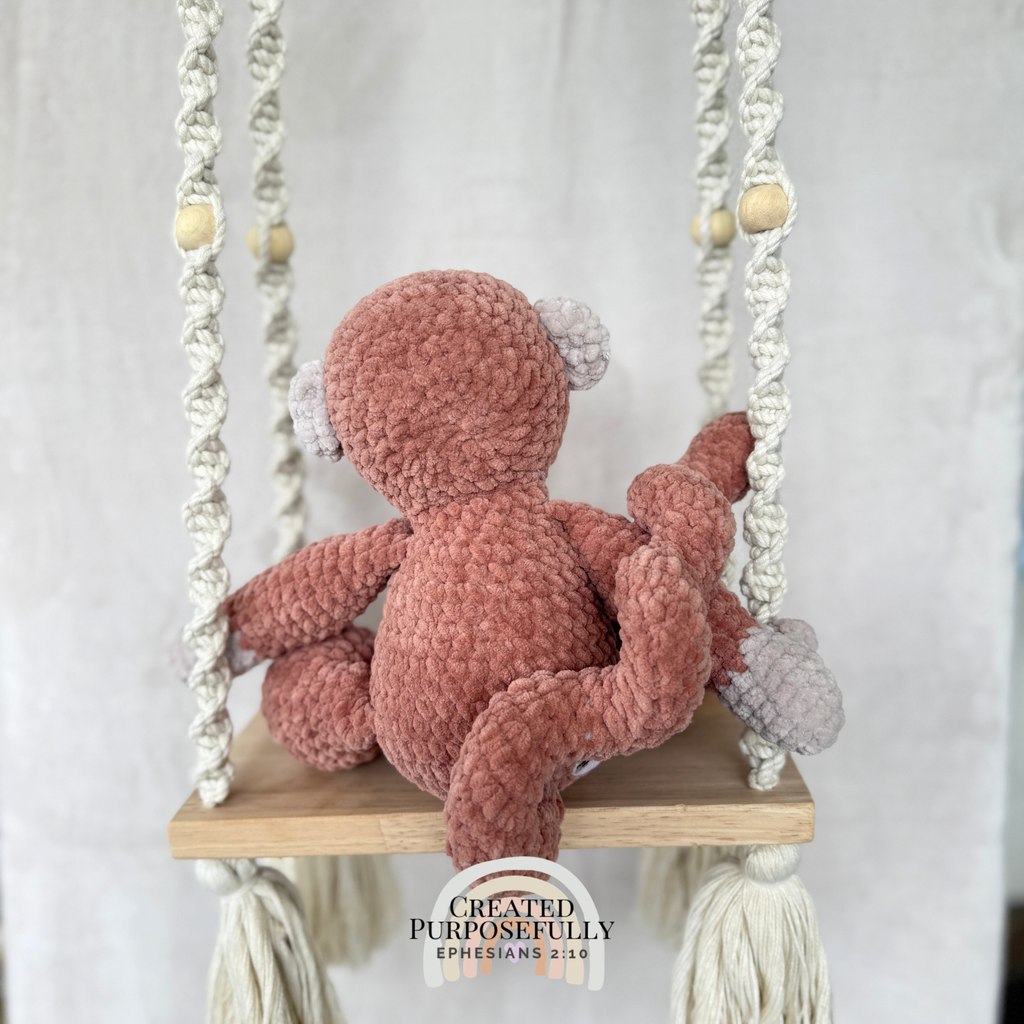 Handmade crochet monkey plush made with soft plush yarn and adorable handmade details