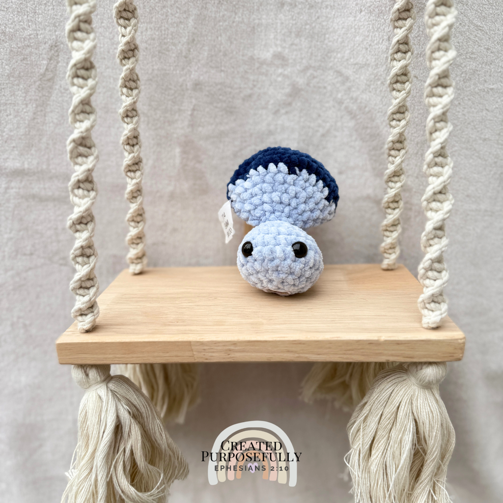 Handmade crochet mushroom pop fidget plush made with soft plush yarn, perfect as a sensory toy, gift, and cute handmade stuffed mushroom.