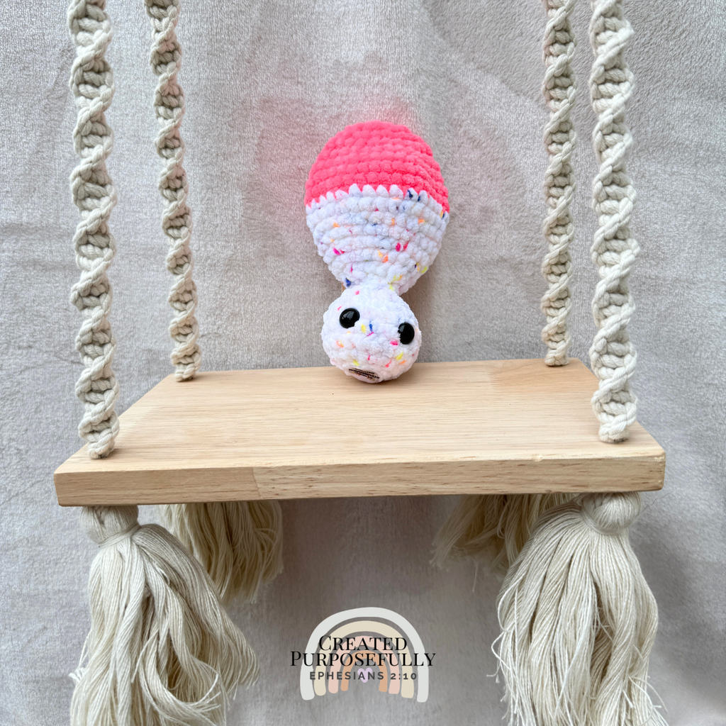Handmade crochet mushroom pop fidget plush made with soft plush yarn, perfect as a sensory toy, gift, and cute handmade stuffed mushroom.