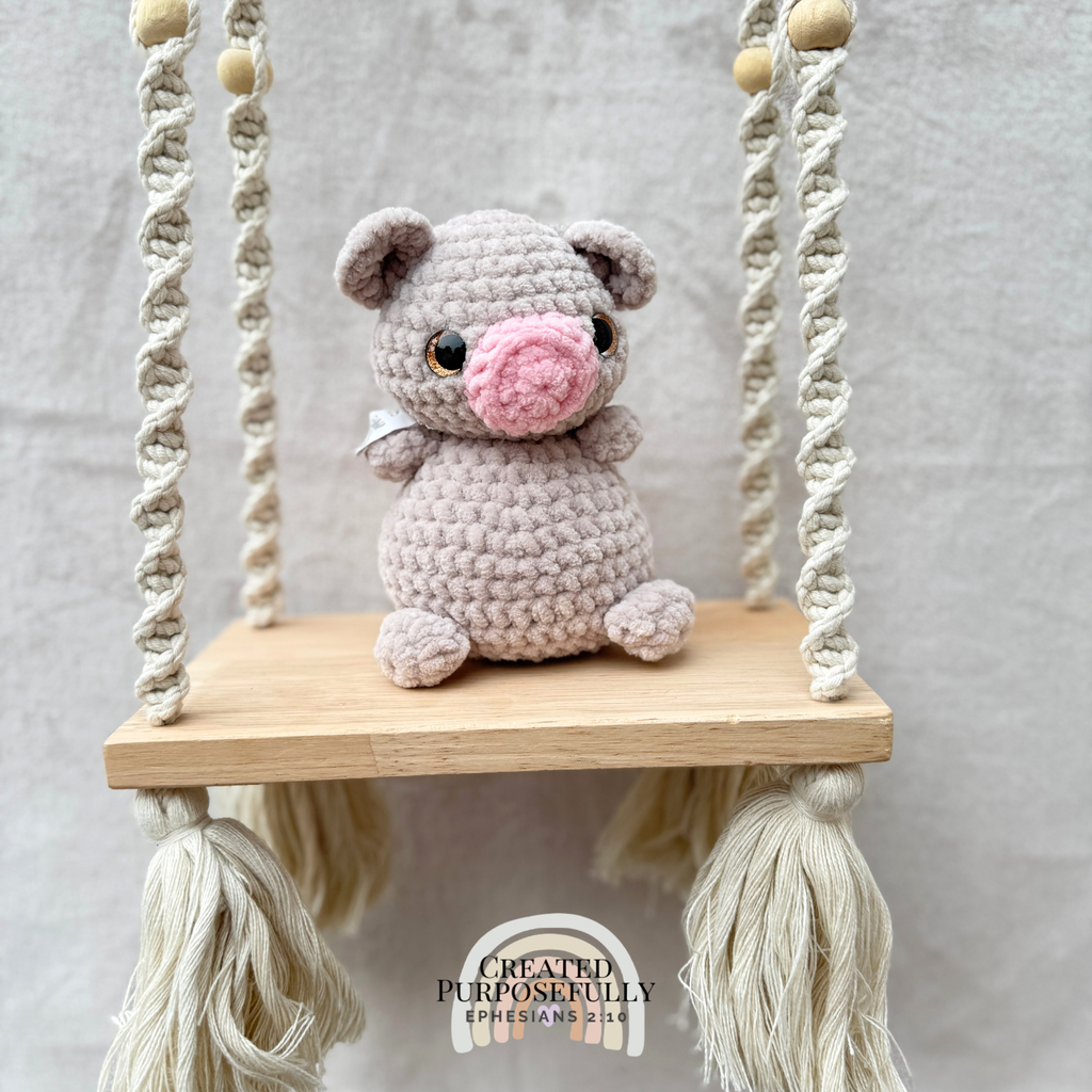 Handmade crochet pig plush made with soft plush yarn, a cute stuffed farm animal gift for kids, pig lovers, and plush collectors.