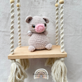 Handmade crochet pig plush made with soft plush yarn, a cute stuffed farm animal gift for kids, pig lovers, and plush collectors.