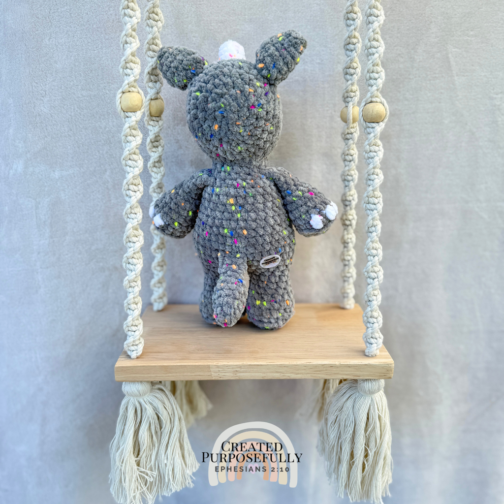 Handmade crochet rhino plush with a small horn made with soft cuddly yarn by Created Purposefully