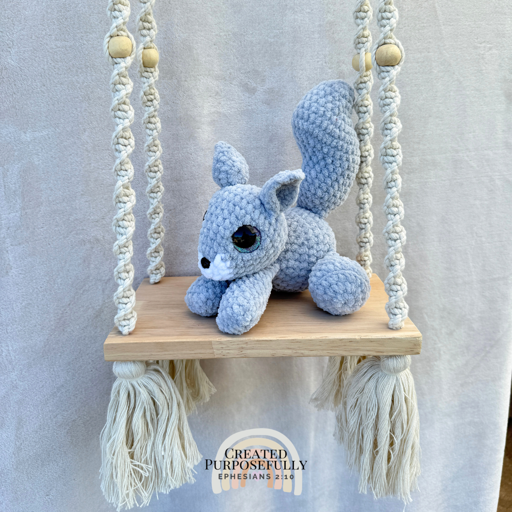 Handmade crochet squirrel plush with a bushy tail made with soft cuddly yarn by Created Purposefully
