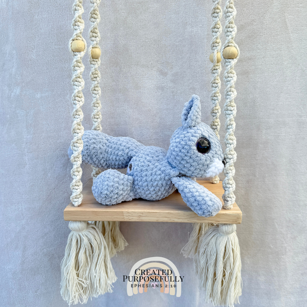Handmade crochet squirrel plush with a bushy tail made with soft cuddly yarn by Created Purposefully
