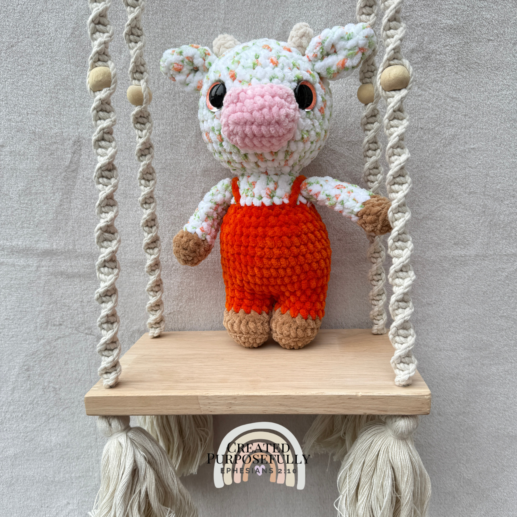 Handmade crochet standing cow made with ultra soft plush yarn. Choose purple, pink, or blue overalls. A sweet gift for cow lovers of all ages.