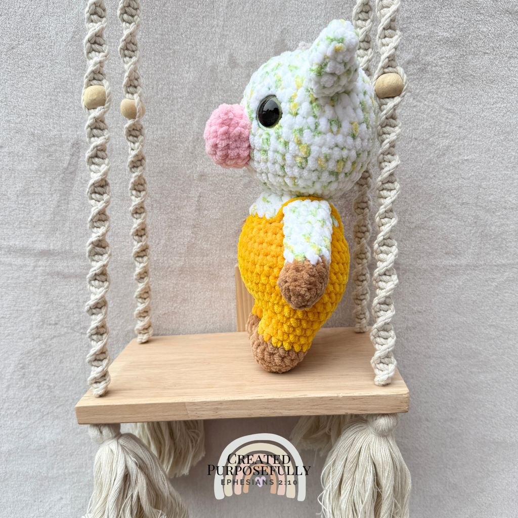Handmade crochet standing cow made with ultra soft plush yarn. Choose purple, pink, or blue overalls. A sweet gift for cow lovers of all ages.