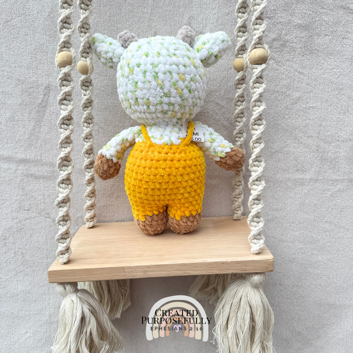 Handmade crochet standing cow made with ultra soft plush yarn. Choose purple, pink, or blue overalls. A sweet gift for cow lovers of all ages.