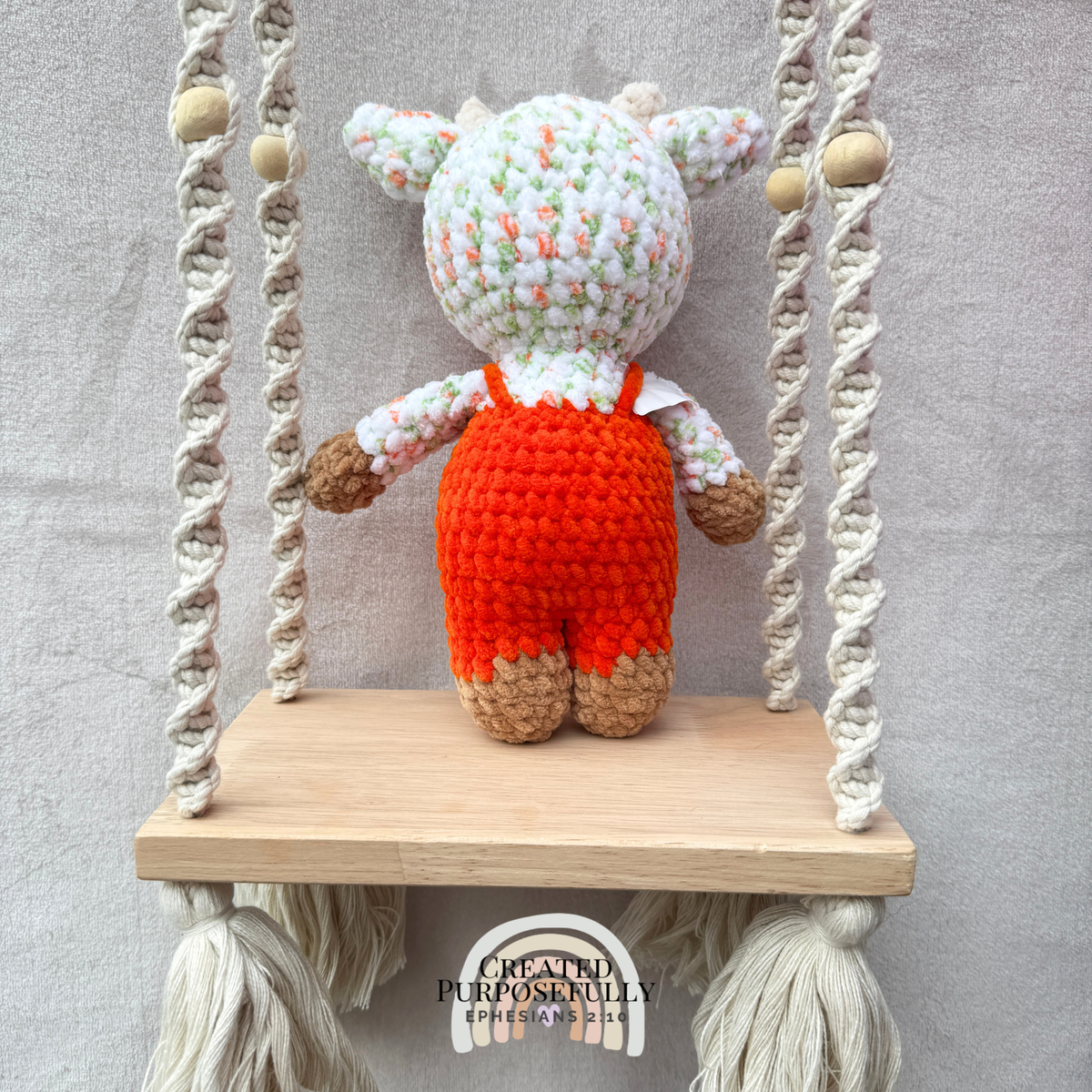 Handmade crochet standing cow made with ultra soft plush yarn. Choose purple, pink, or blue overalls. A sweet gift for cow lovers of all ages.
