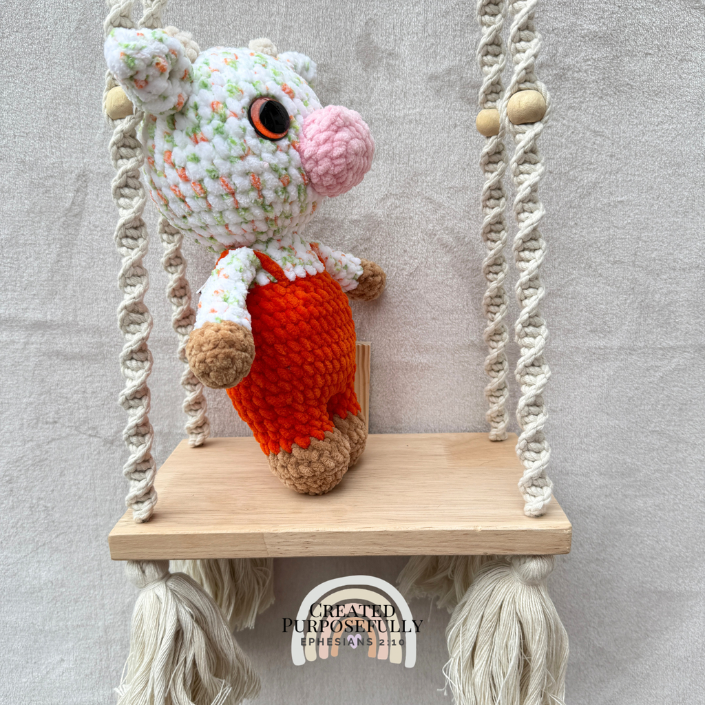 Handmade crochet standing cow made with ultra soft plush yarn. Choose purple, pink, or blue overalls. A sweet gift for cow lovers of all ages.