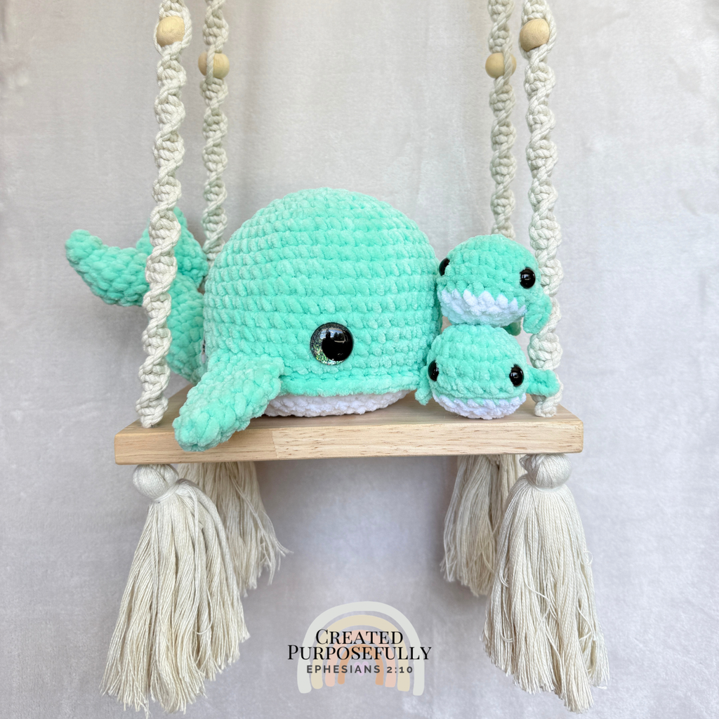 Handmade crochet whale family with one mama whale and two baby whales made with soft plush yarn