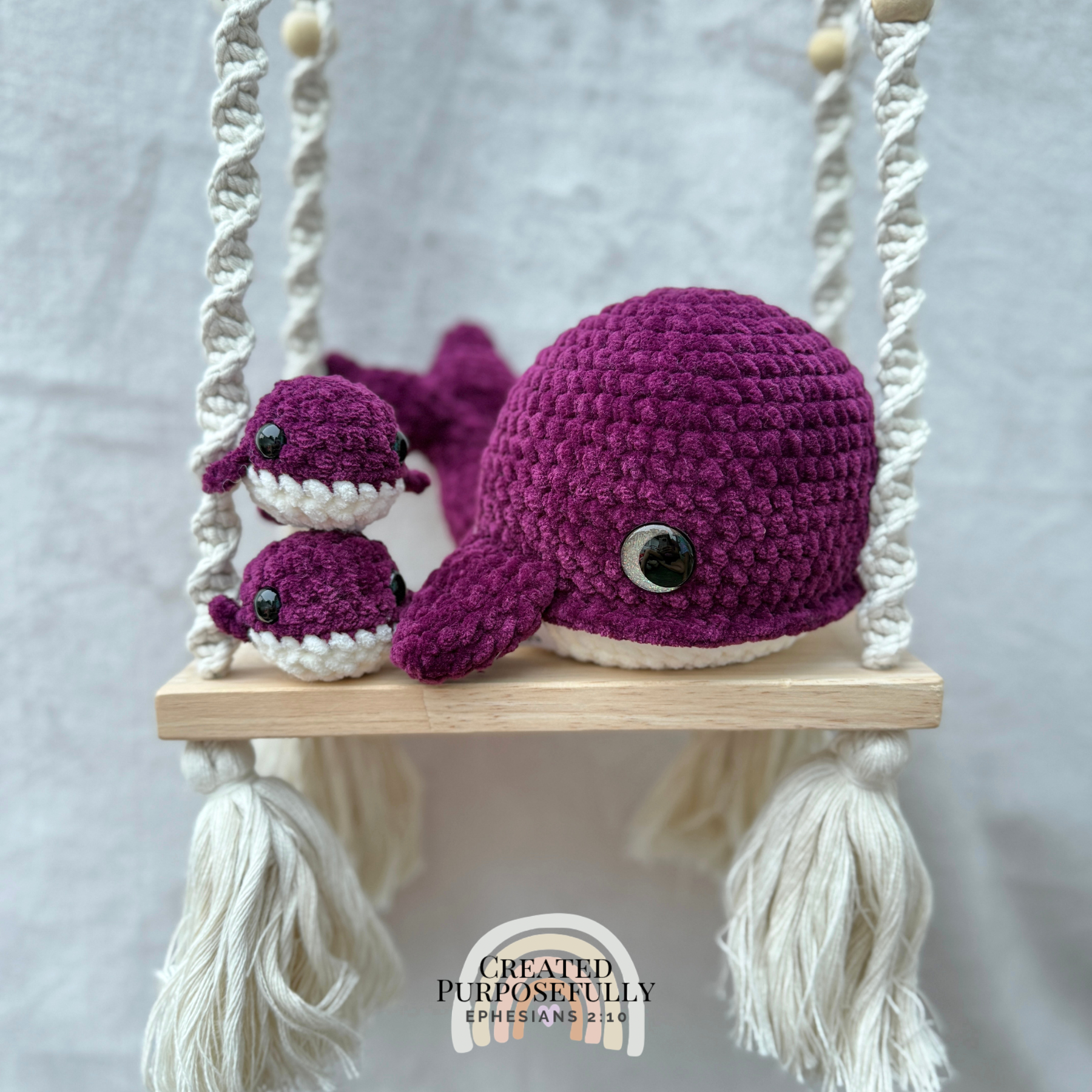Handmade crochet whale family with one mama whale and two baby whales made with soft plush yarn