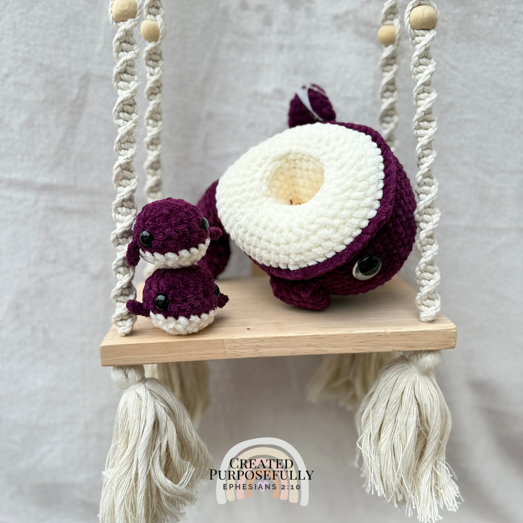 Handmade crochet whale family with one mama whale and two baby whales made with soft plush yarn