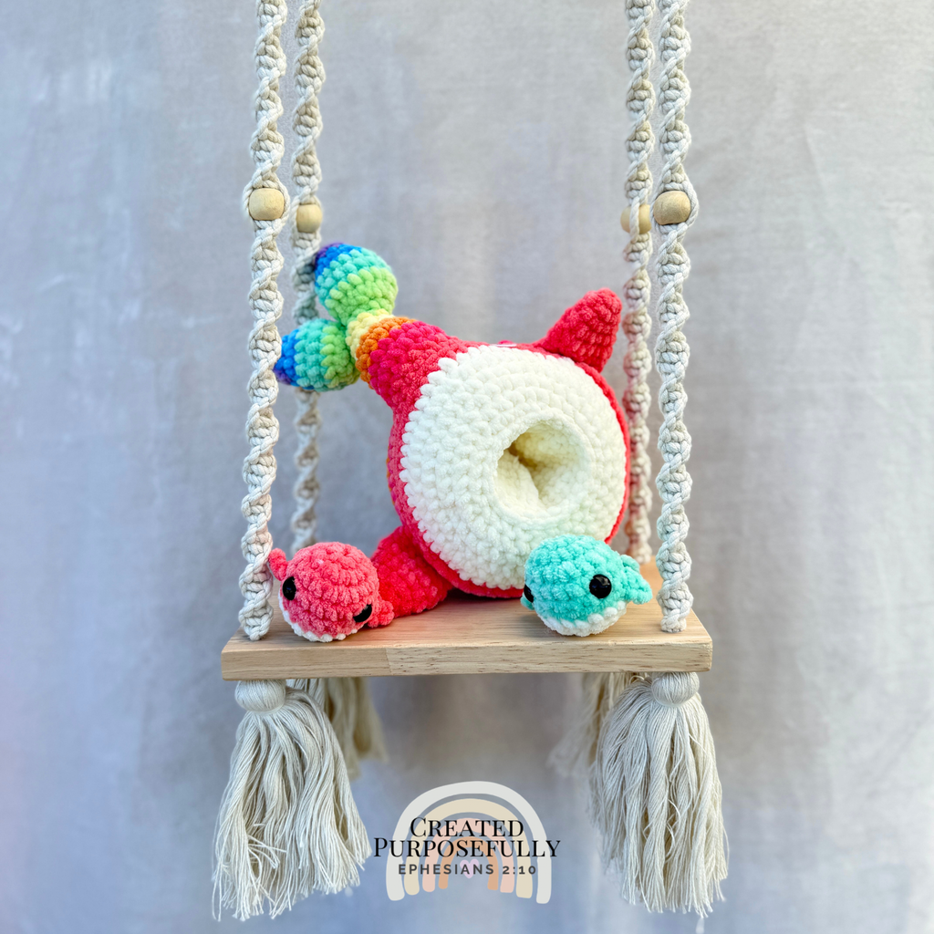 Handmade crochet whale family with one mama whale and two baby whales made with soft plush yarn
