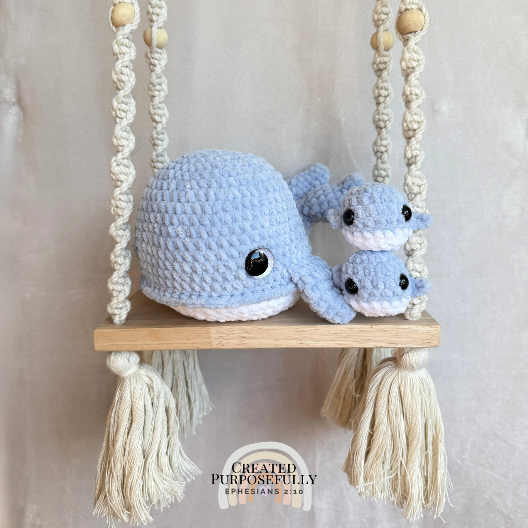 Handmade crochet whale family with one mama whale and two baby whales made with soft plush yarn