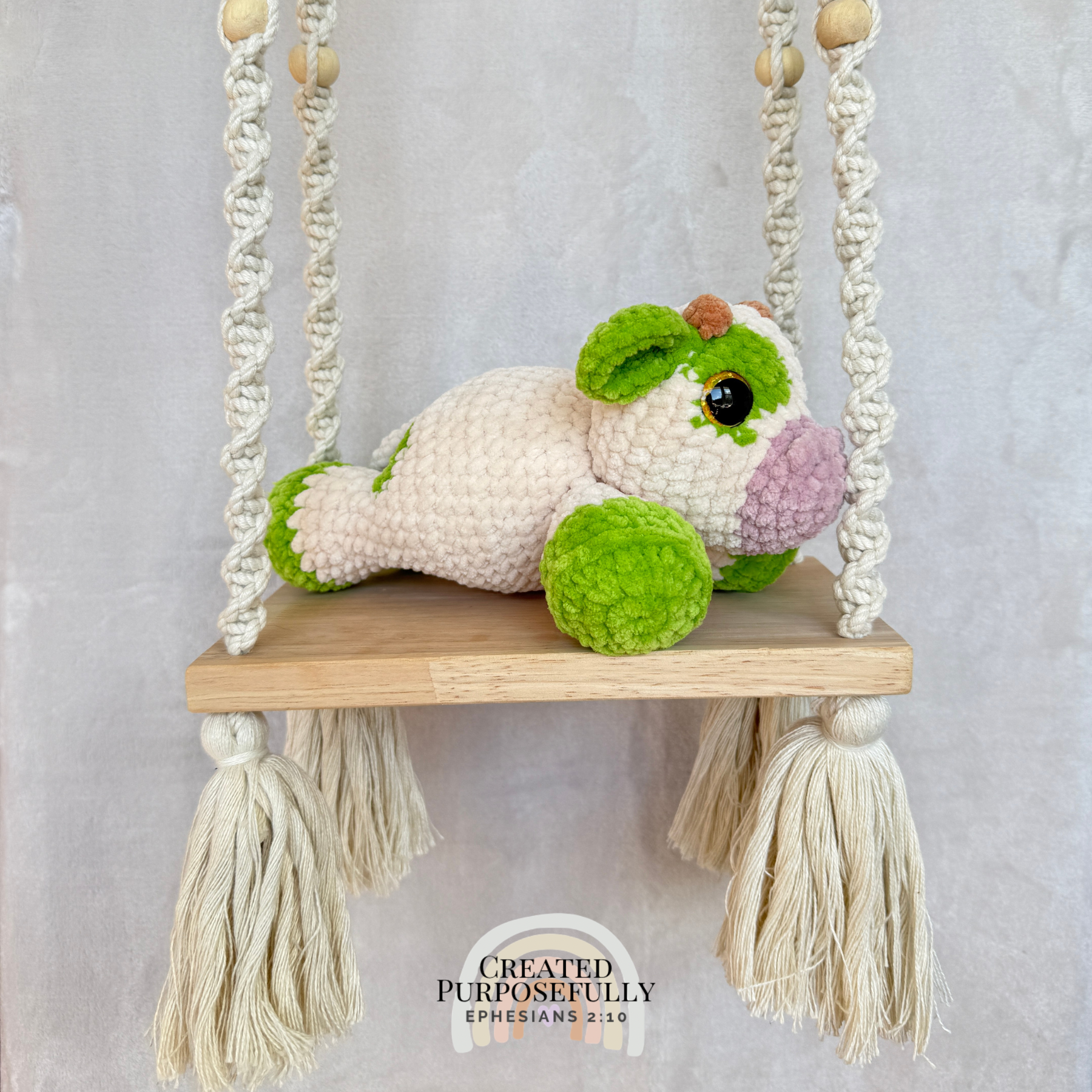 Handmade green crochet cow plush made with soft plush yarn and adorable handmade details