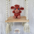 Handmade Highland cow crochet plush made with soft plush yarn and adorable handmade details